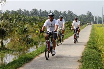 CYCLING to tra que village